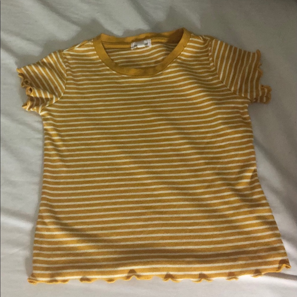 Yellow striped short sleeve shirt.